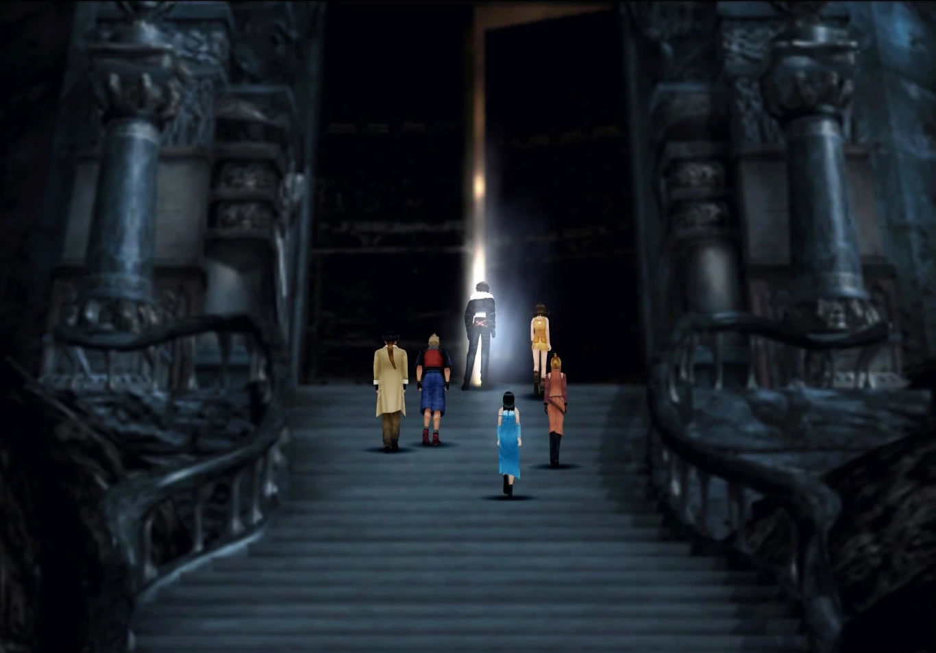 The Final Fantasy VIII party walking up the steps to an ominously cracked door at the front of a castle.
