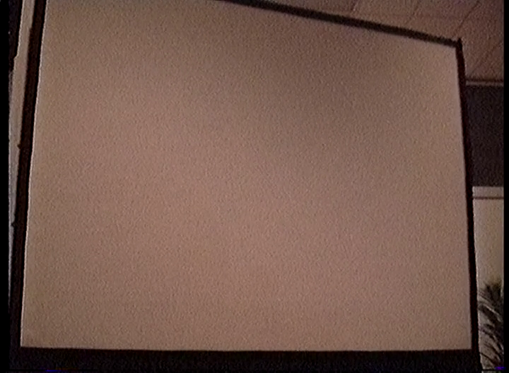 A blank projector screen.